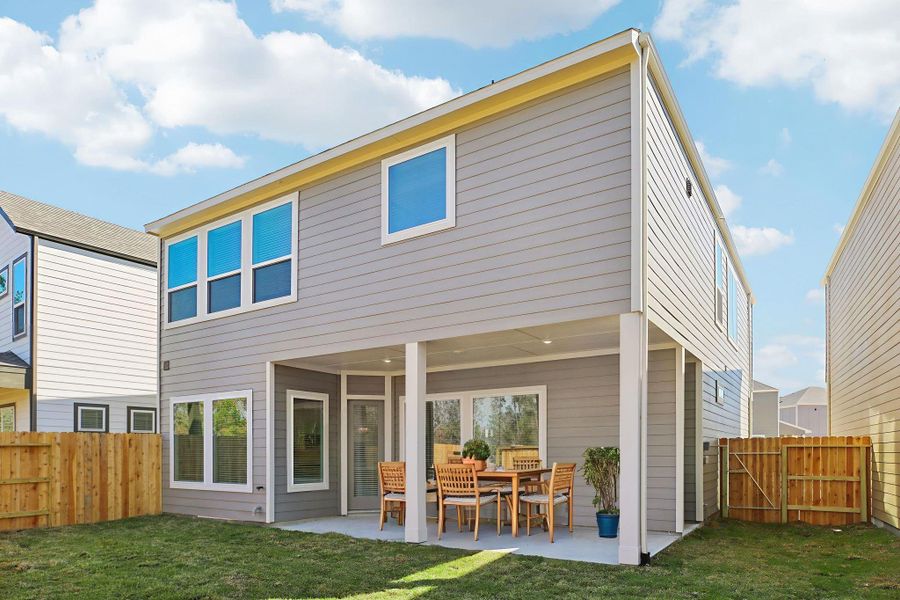 Exterior details and patio area of a home in Pinewood Trails - Luxe Series, Houston (Image 28).