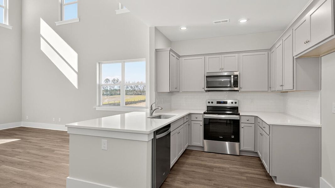 Furnished interior view inside a new home in Indigo Preserve Townhomes, Leland (Image 10).