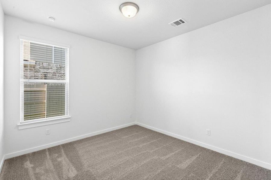 Spacious, unfurnished interior of a new home in The Colony, Bastrop (Image 24).