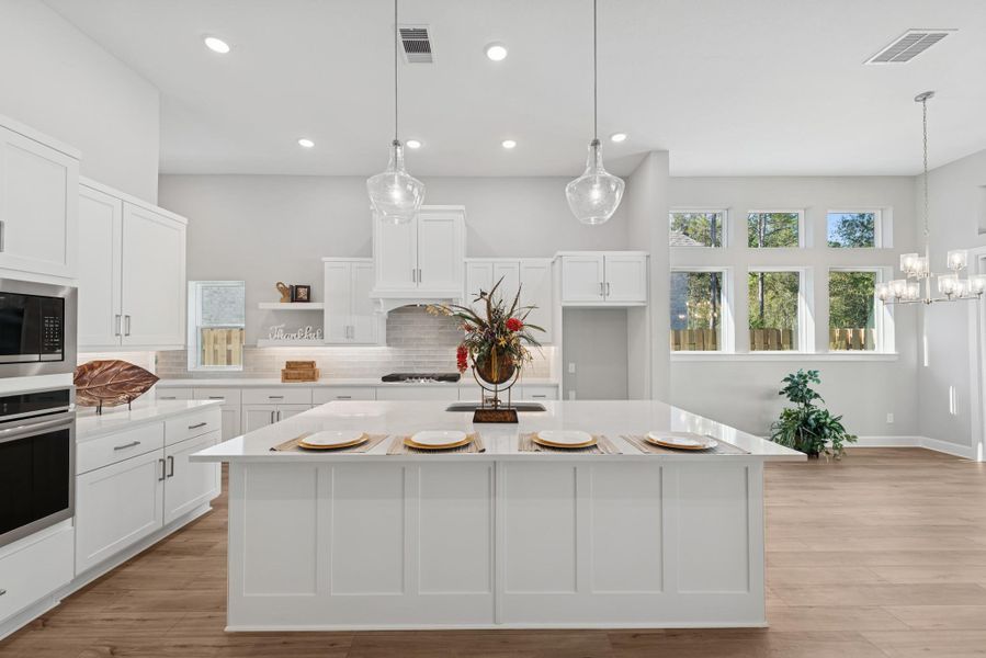 EXAMPLE PHOTO: Gorgeous Kitchen with lots of cabinets, 12 ft ceilings and quartz counters!