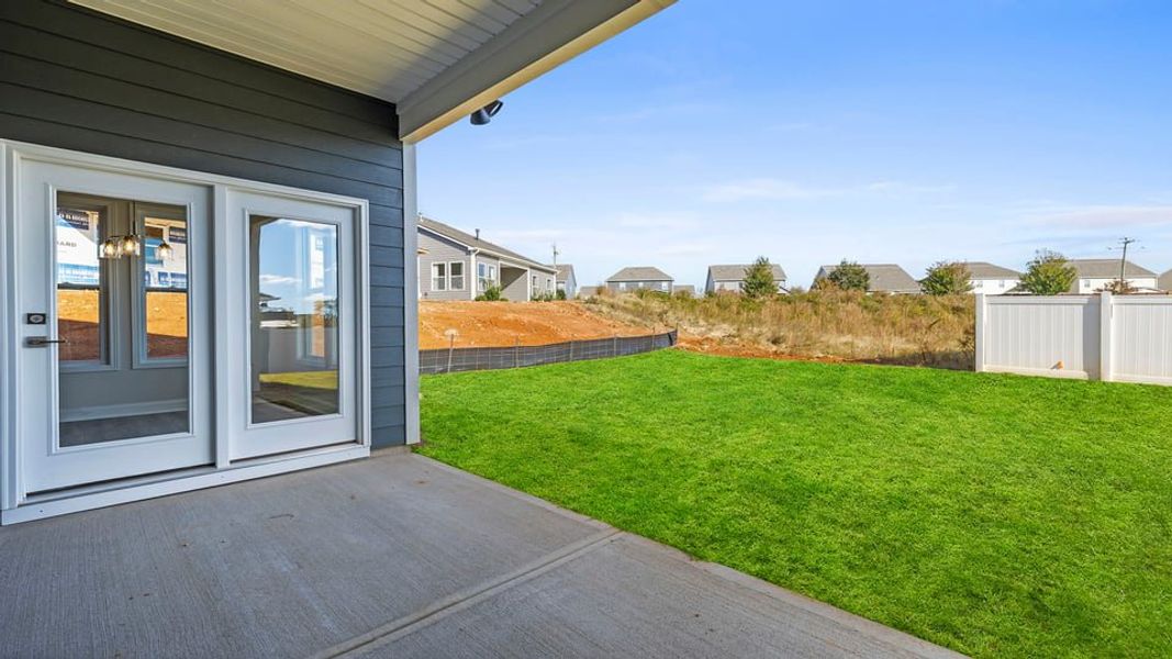 Exterior details and patio area of a home in Whitehawk Meadows, Travelers Rest (Image 20).