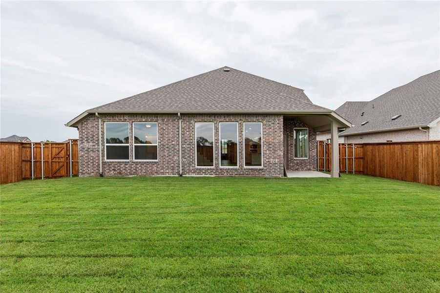 Front exterior of a new home in River Ranch, Van Alstyne, TX, highlighting curb appeal (Image 1). Front exterior of a new home in River Ranch, Van Alstyne, TX, highlighting curb appeal (Image 1).