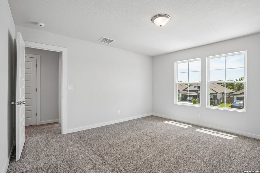 Spacious, unfurnished interior of a new home in August Fields, New Braunfels (Image 35).