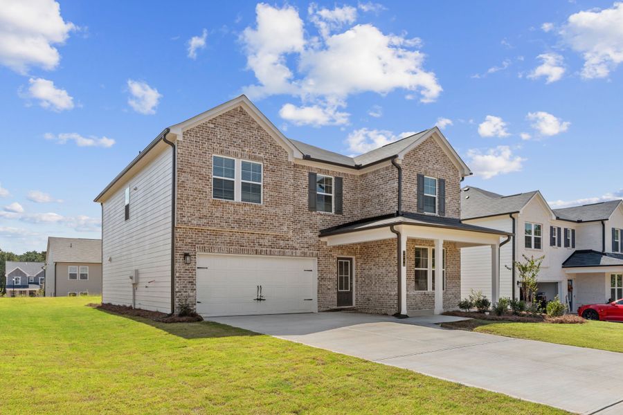 A large house with a garage. A large house with a garage.