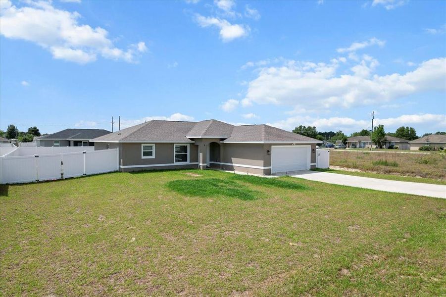 Front exterior of a new home in , Ocala, FL, highlighting curb appeal (Image 26).
