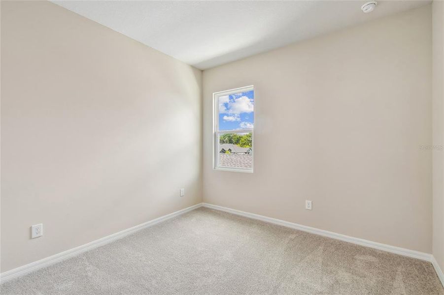 Spacious, unfurnished interior of a new home in Oakfield at Mount Dora Cottage Series, Mount Dora (Image 31).