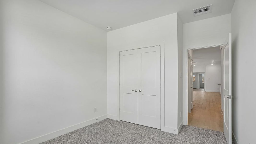 Spacious, unfurnished interior of a new home in Meridiana Townhomes, Iowa Colony (Image 16).