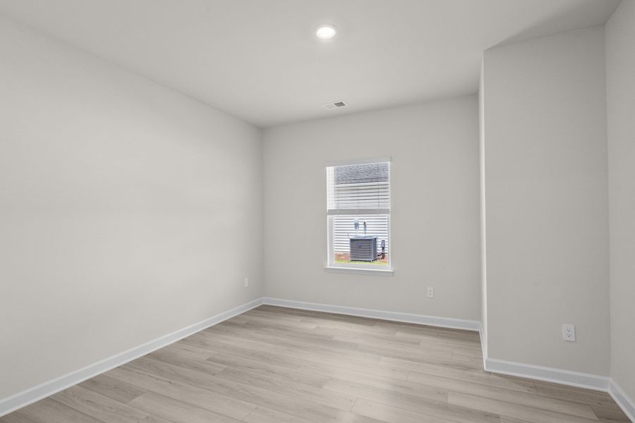 Spacious, unfurnished interior of a new home in Cypress Ridge - The Coastline Series, Longs (Image 23).