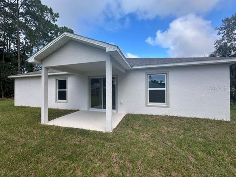 Exterior details and patio area of a home in Palm Coast, Palm Coast (Image 2). Exterior details and patio area of a home in Palm Coast, Palm Coast (Image 2).