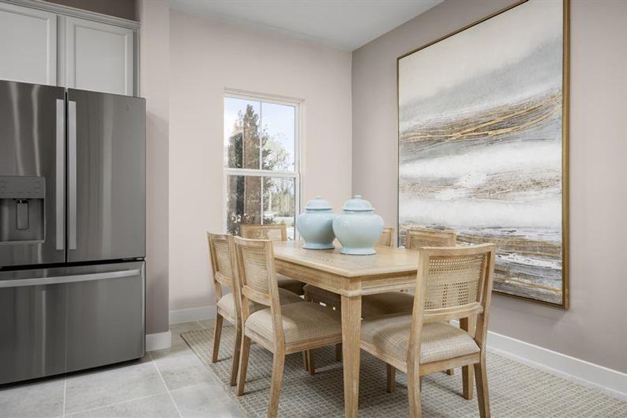 Representative furnished interior of a home built from the Allegro by Ryan Homes in Lake Mattie Preserve Townhomes, Auburndale (Image 6).