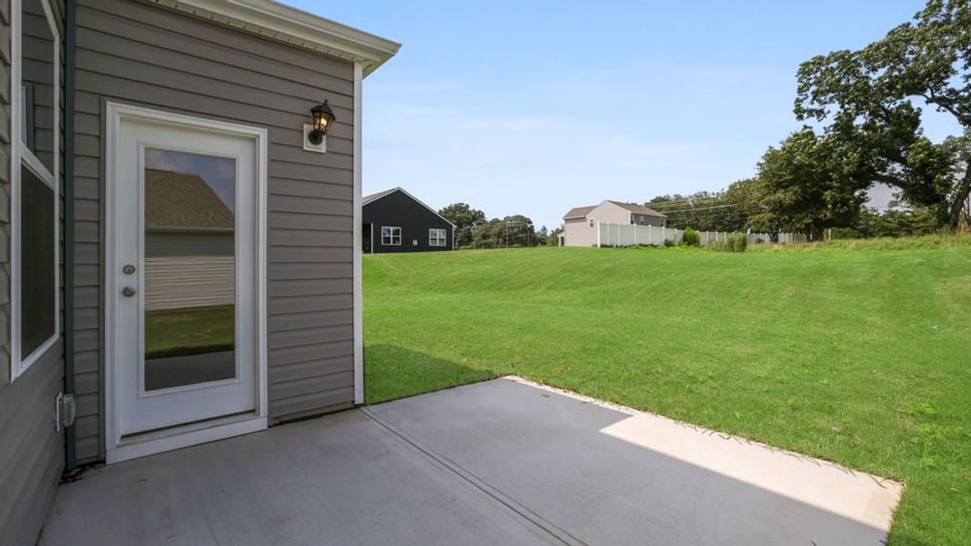 Exterior details and patio area of a home in Benjamin's Grove, Woodruff (Image 22). Exterior details and patio area of a home in Benjamin's Grove, Woodruff (Image 22).