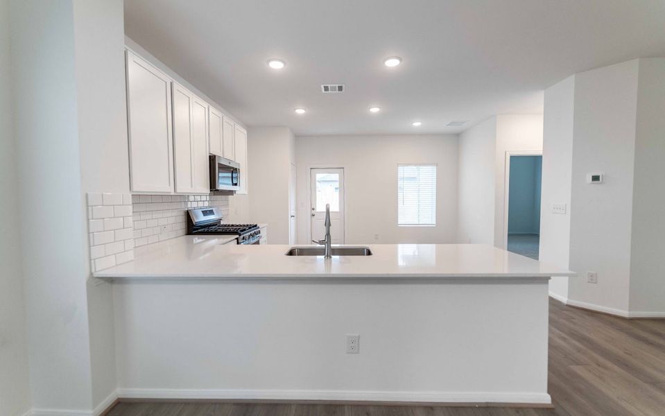 Furnished interior view inside a new home in Briarwood, Elgin (Image 5).