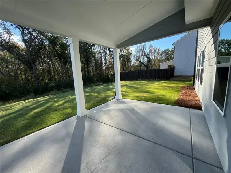 Exterior details and patio area of a home in Rosewood Lake Estates, Hoschton (Image 3).