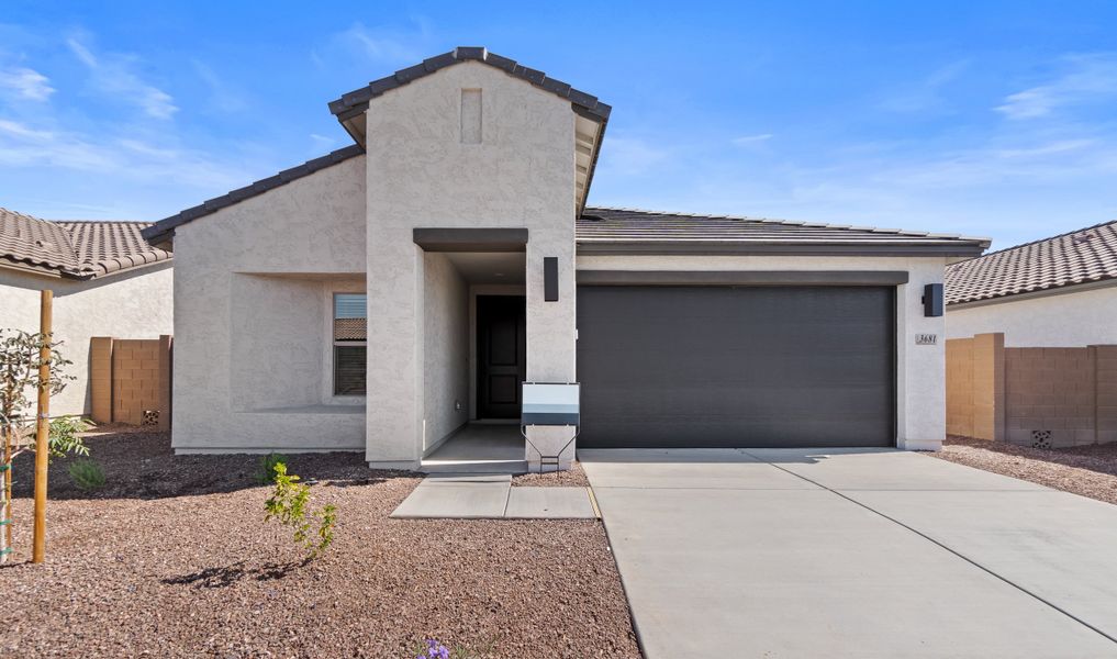 Representative exterior photo of a completed home built from the Godavari by K. Hovnanian® Homes in Monroe Ranch, Buckeye, AZ (Image 16). Representative exterior photo of a completed home built from the Godavari by K. Hovnanian® Homes in Monroe Ranch, Buckeye, AZ (Image 16).