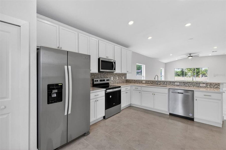 Furnished interior view inside a new home in , Port Charlotte (Image 9).