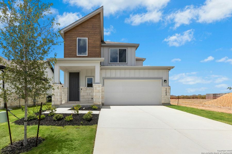 Front exterior of a new home in Willowbrook, New Braunfels, TX, highlighting curb appeal (Image 16).