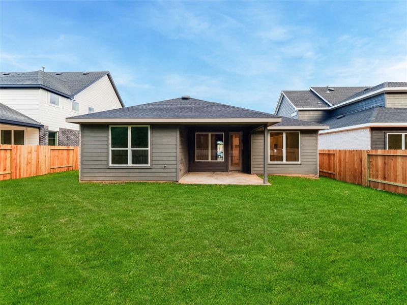 Front exterior of a new home in Silverthorne, Conroe, TX, highlighting curb appeal (Image 14). Front exterior of a new home in Silverthorne, Conroe, TX, highlighting curb appeal (Image 14).