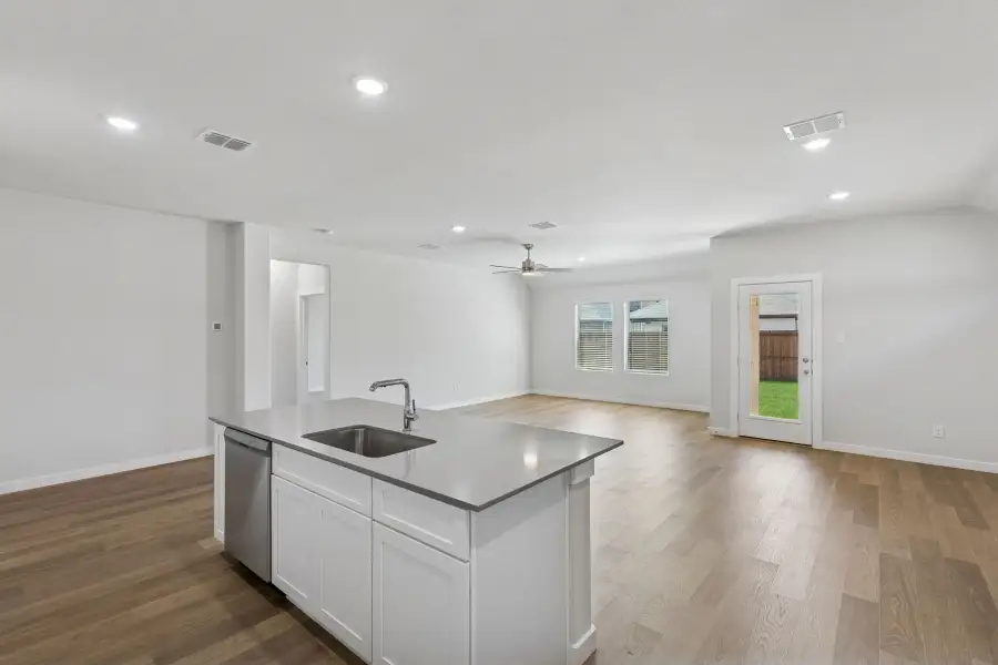 Open Floor Plan in the Harrison home plan by Trophy Signature Homes – REPRESENTATIVE PHOTO Open Floor Plan in the Harrison home plan by Trophy Signature Homes – REPRESENTATIVE PHOTO