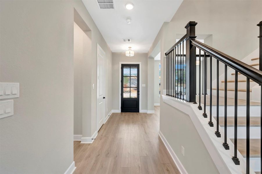 8 ft front door compliments this entry!