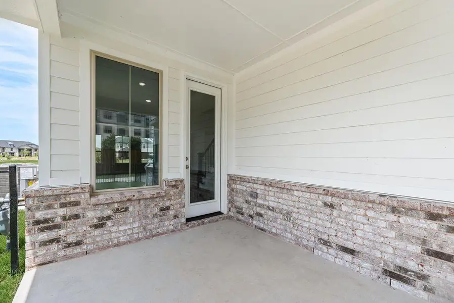 Exterior details and patio area of a home in Bayside, Rowlett (Image 4). Exterior details and patio area of a home in Bayside, Rowlett (Image 4).