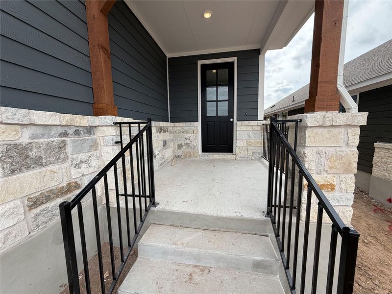 Exterior details and patio area of a home in Cannon Ranch 40s, Dripping Springs (Image 3).