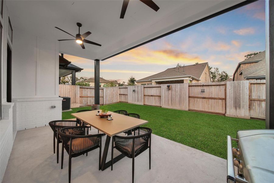 Exterior details and patio area of a home in The Highlands: Highland Duets, Porter (Image 19). Exterior details and patio area of a home in The Highlands: Highland Duets, Porter (Image 19).