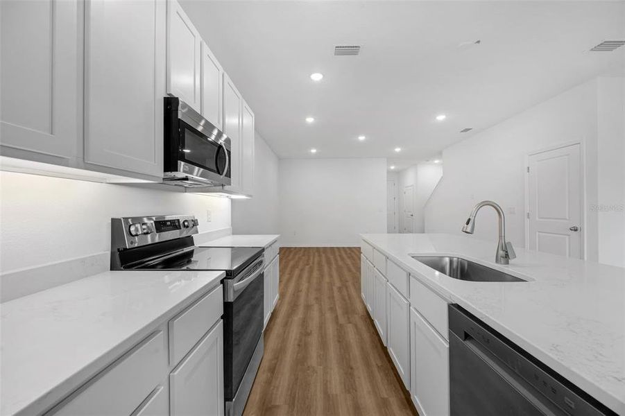 Furnished interior view inside a new home in Delaney Reserve, Deland (Image 12).