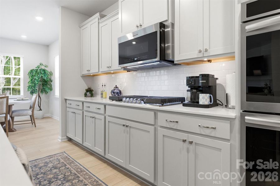Furnished interior view inside a new home in Falls Cove at Lake Norman, Troutman (Image 9).