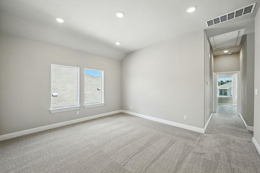 Spare room featuring attic access, light colored carpet, and recessed lighting Spare room featuring attic access, light colored carpet, and recessed lighting