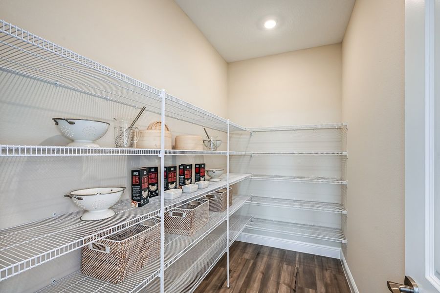 Representative furnished interior of a home built from the Mariposa by Casa Fresca Homes in Mirada, San Antonio (Image 9).
