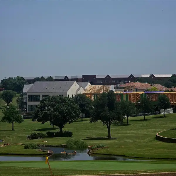 View from the cart path to The Residences View from the cart path to The Residences