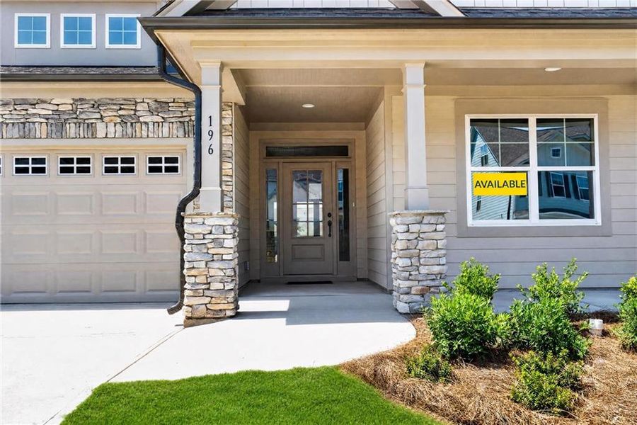 Exterior details and patio area of a home in Twin Lakes, Hoschton (Image 3).
