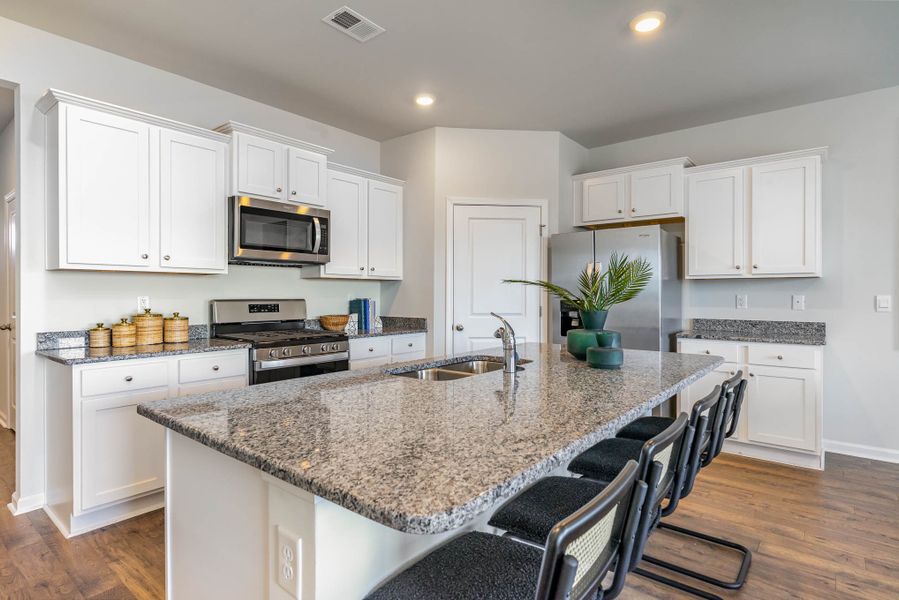Representative furnished interior of a home built from the CALI by D.R. Horton in Kingston Bay, Conway (Image 14).