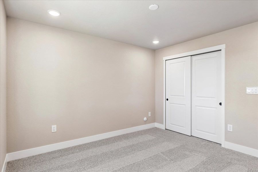 Spacious, unfurnished interior of a new home in The Trails at Aspen Ridge, Colorado Springs (Image 27).