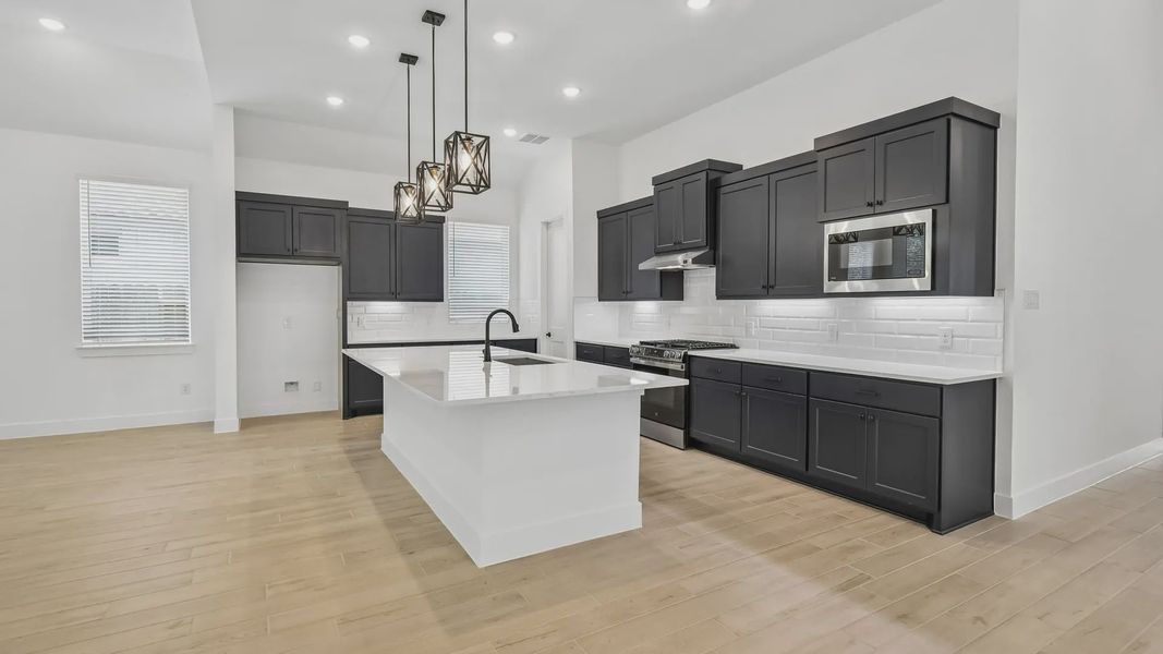 Furnished interior view inside a new home in Artavia, Conroe (Image 8).