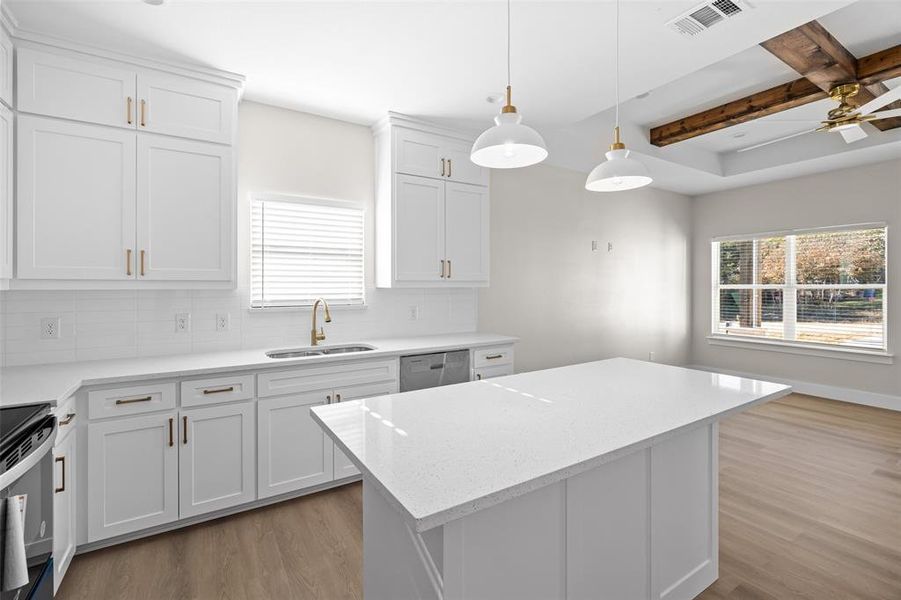 Kitchen island and beautiful cabinets