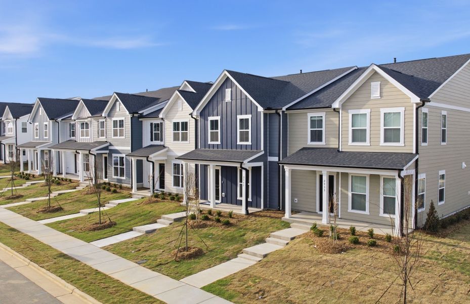 Front exterior of a new home in Saunders Farm, Willow Spring, NC, highlighting curb appeal (Image 19). Front exterior of a new home in Saunders Farm, Willow Spring, NC, highlighting curb appeal (Image 19).