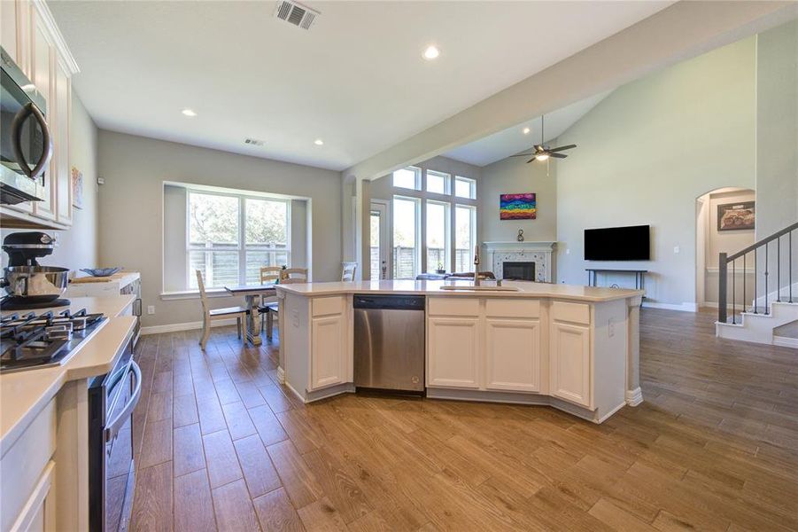 Expansive view from kitchen to living area    - Bright