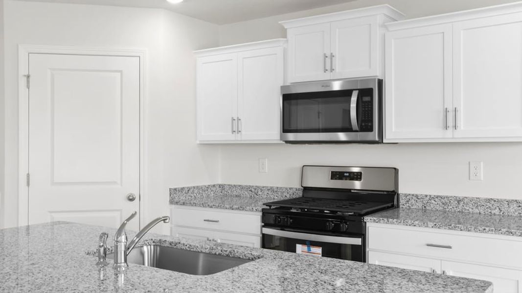 Furnished interior view inside a new home in Varner Station, Woodruff (Image 6).