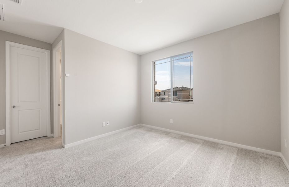 Spacious, unfurnished interior of a new home in Legado West, Queen Creek (Image 29).