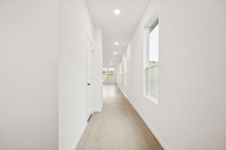 Representative unfurnished interior of a home built from the Beeville by Pulte Homes in Saddleback at Santa Rita Ranch, Liberty Hill (Image 14).