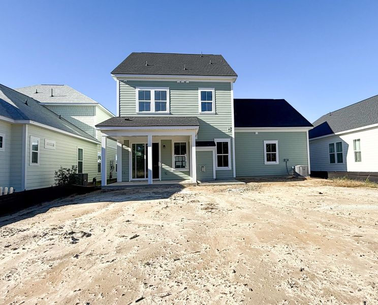 Exterior details and patio area of a home in Single Family Homes at Nexton, Summerville (Image 2).