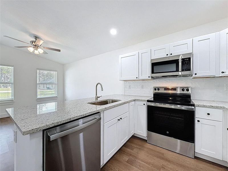 Furnished interior view inside a new home in , Weeki Wachee (Image 5).