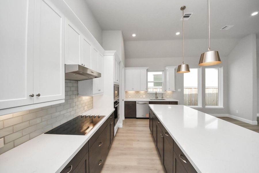 Furnished interior view inside a new home in Bridgeland: Heritage Collection, Cypress (Image 2). Furnished interior view inside a new home in Bridgeland: Heritage Collection, Cypress (Image 2).