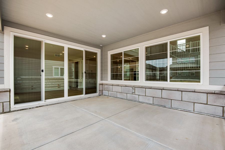 Exterior details and patio area of a home in The Aurora Highlands, Aurora (Image 3). Exterior details and patio area of a home in The Aurora Highlands, Aurora (Image 3).