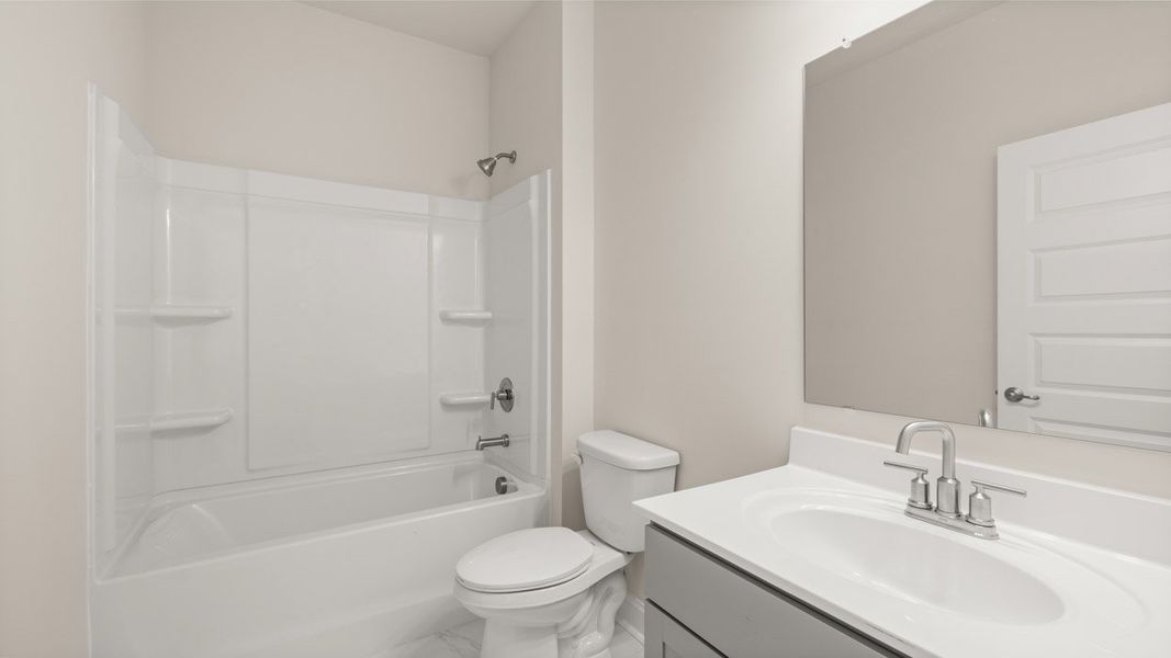 Furnished interior view inside a new home in Oak Ridge Meadows - Active Adult, Locust Grove (Image 13).