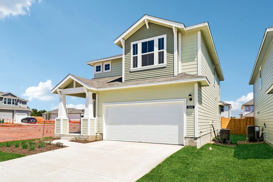 Front exterior of a new home in Edgebrooke, Pflugerville, TX, highlighting curb appeal (Image 2). Front exterior of a new home in Edgebrooke, Pflugerville, TX, highlighting curb appeal (Image 2).