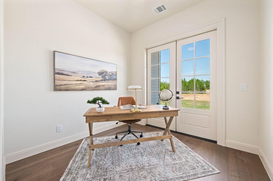 Home office featuring wood-type flooring