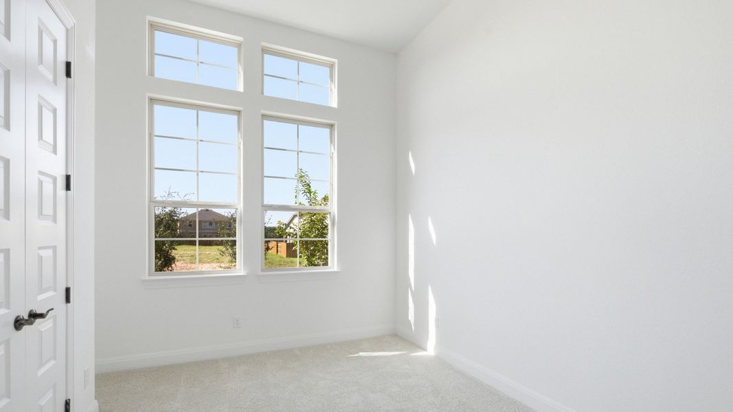Furnished interior view inside a new home in Oaks at San Gabriel, Georgetown (Image 24).