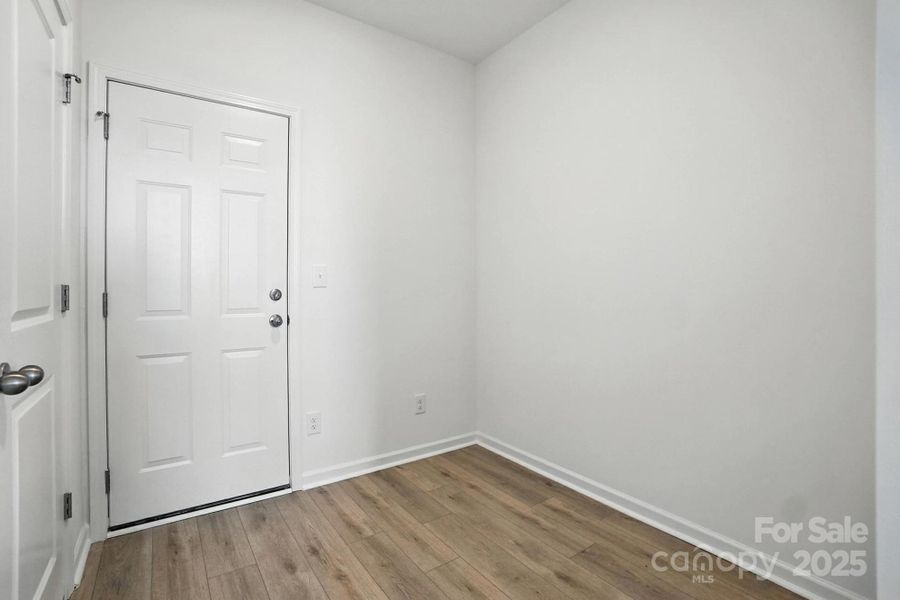 garage entrance with an open space for future drop zone/desk/extra storage